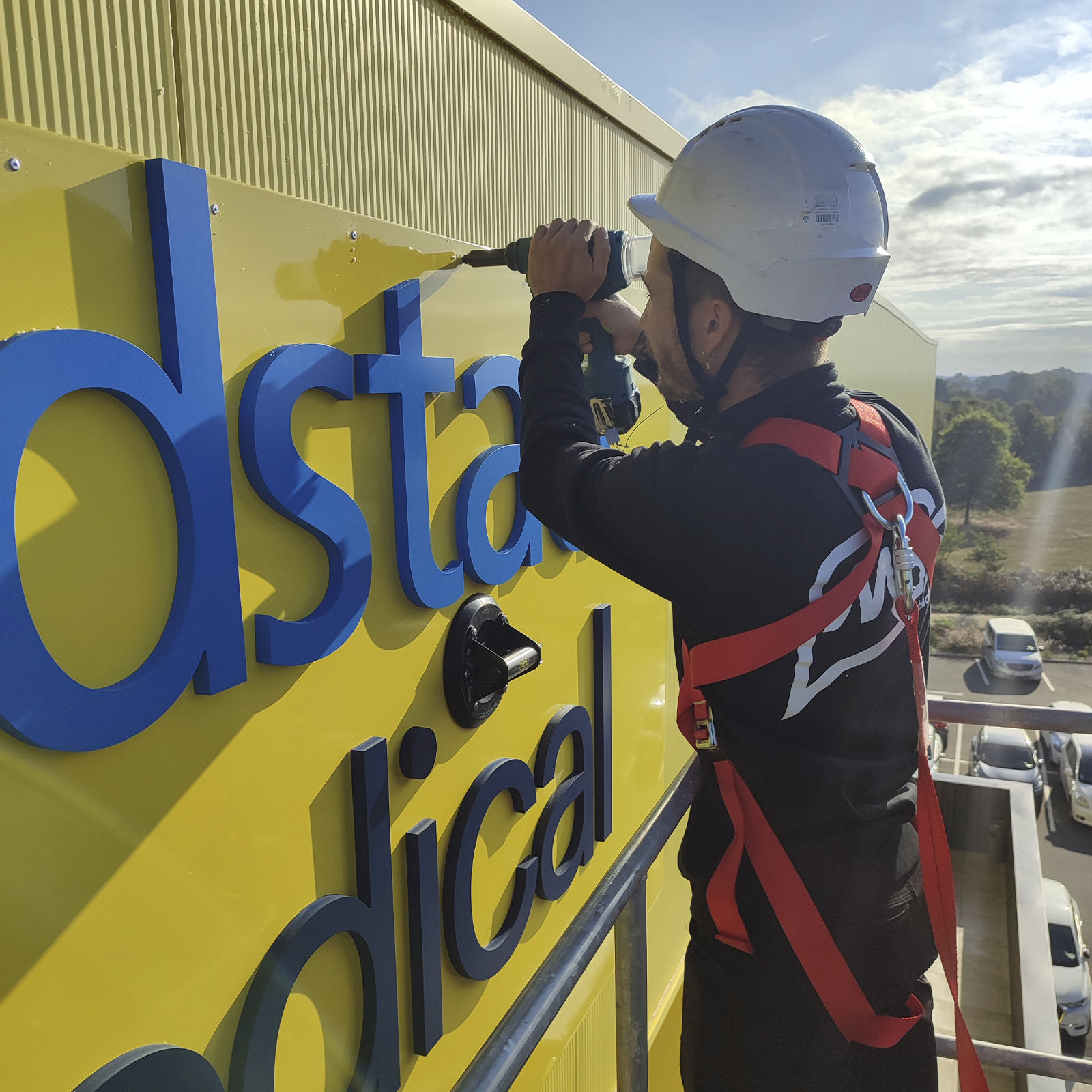 POSE LETTRAGE ENSEIGNE RANDSTAD